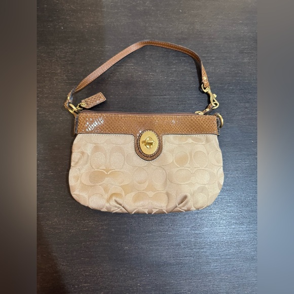 Coach Handbags - Coach. Great condition wristlet.